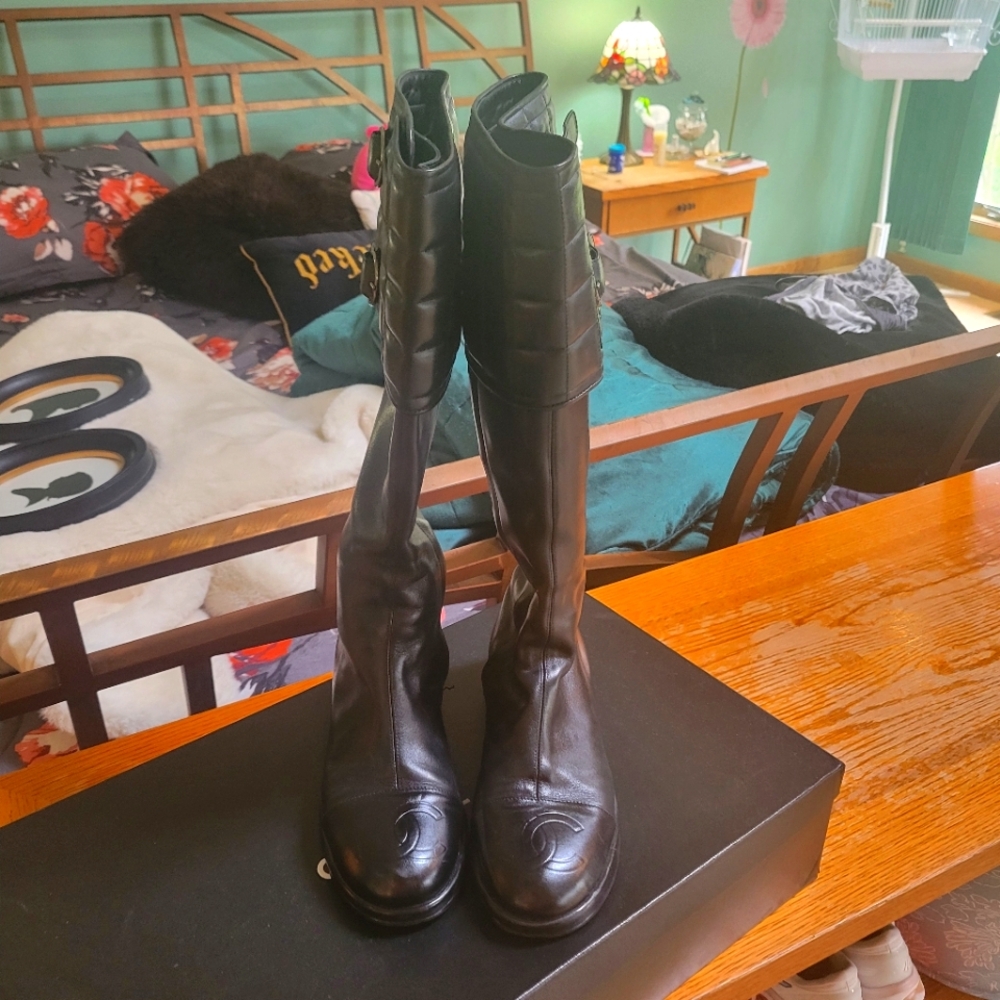 A pair of CHANEL knee length boots